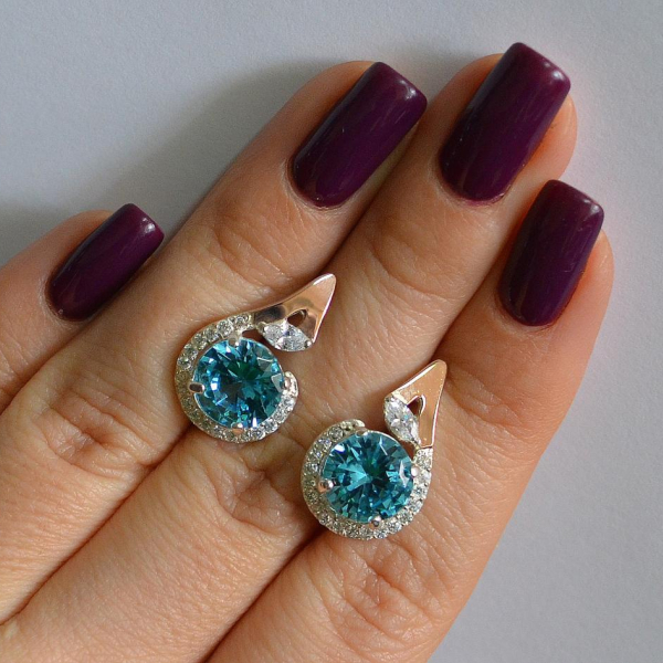 Срібні сережки з золотими вставками