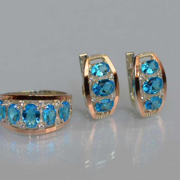 Срібний набір з золотими пластинами