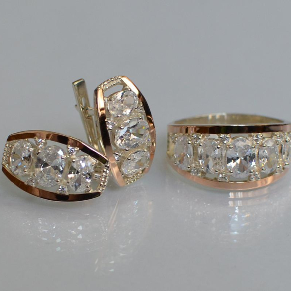 Срібний набір з золотими пластинами