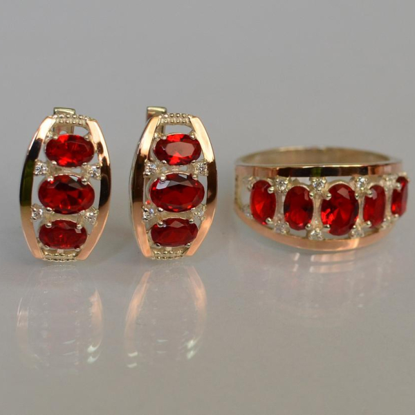 Срібний набір з золотими пластинами