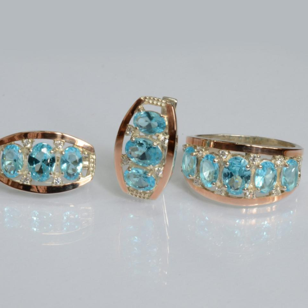 Срібний набір з золотими пластинами