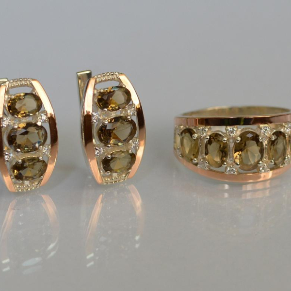 Срібний набір з золотими пластинами