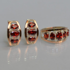 Срібний набір з золотими пластинами