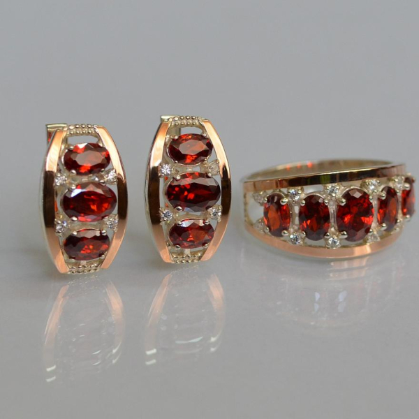 Срібний набір з золотими пластинами