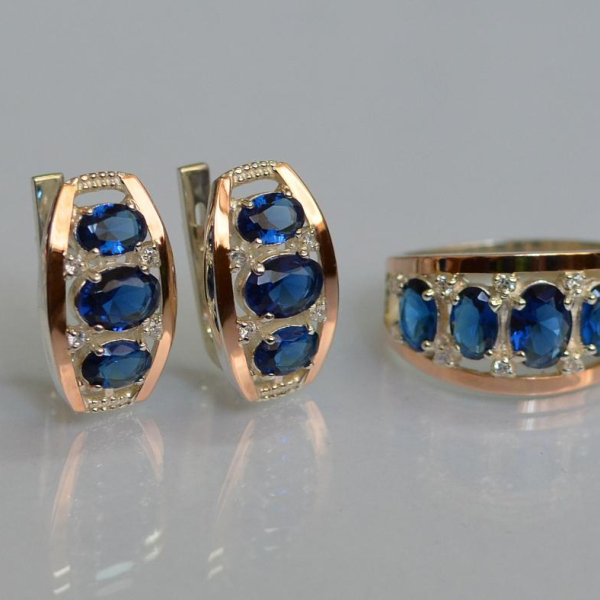 Срібний набір з золотими пластинами