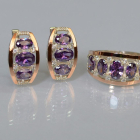 Срібний набір з золотими пластинами