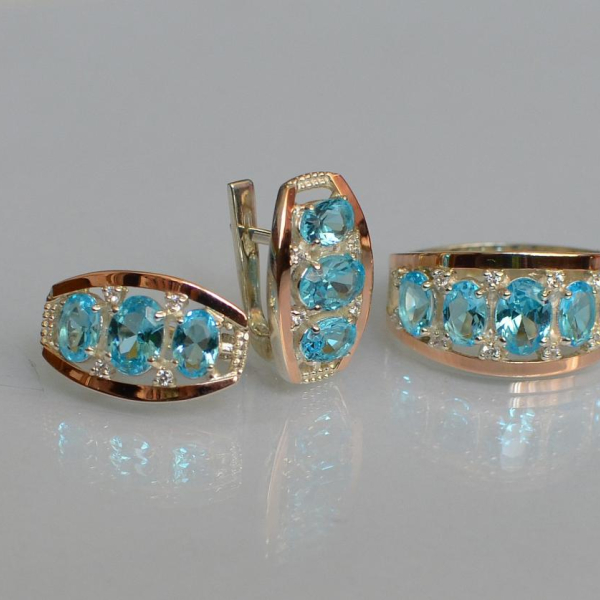 Срібний набір з золотими пластинами