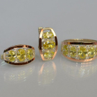 Срібний набір з золотими пластинами