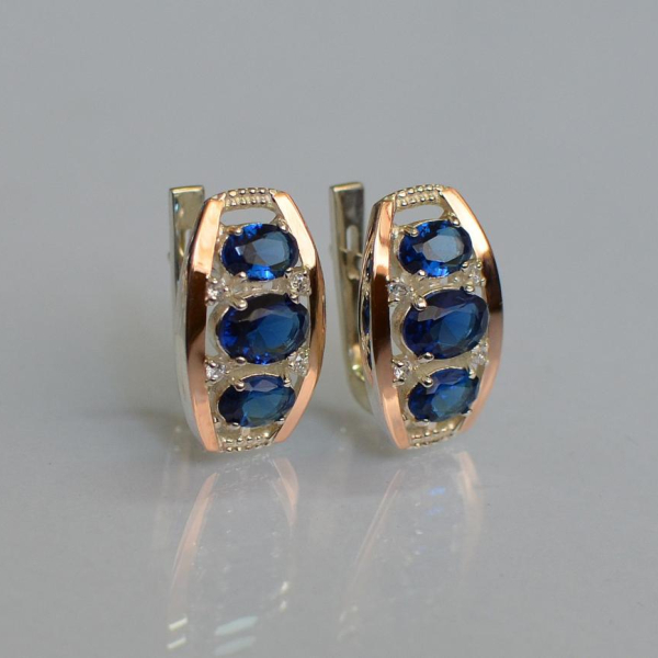 Срібні сережки з золотими вставками