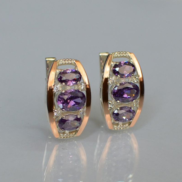 Срібні сережки з золотими вставками