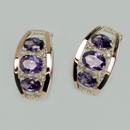 Срібні сережки з золотими вставками