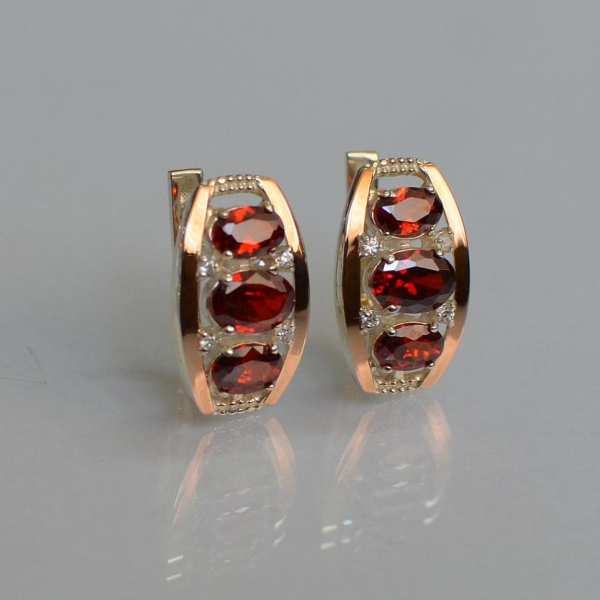 Срібні сережки з золотими вставками