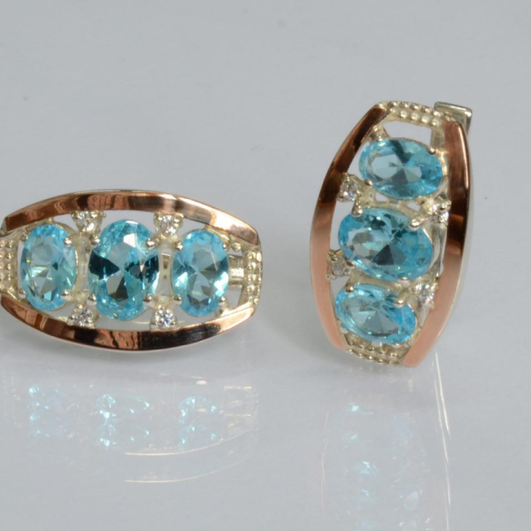 Срібні сережки з золотими вставками