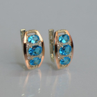 Срібні сережки з золотими вставками