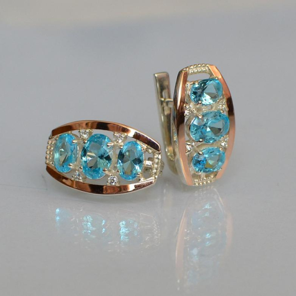 Срібні сережки з золотими вставками