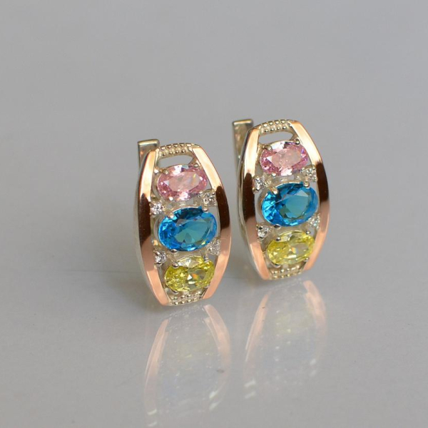 Срібні сережки з золотими вставками