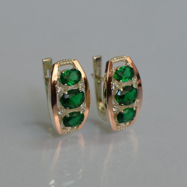 Срібні сережки з золотими вставками