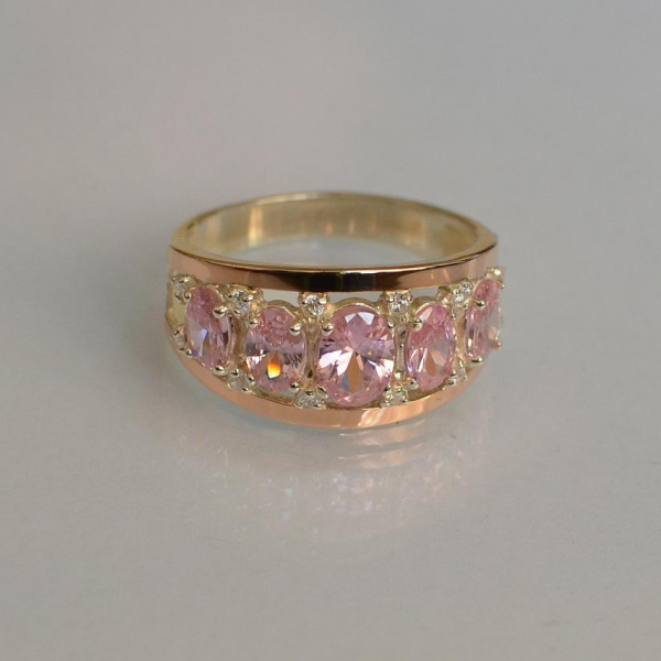 Срібна каблучка з золотими вставками