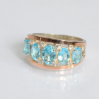 Срібна каблучка з золотими вставками