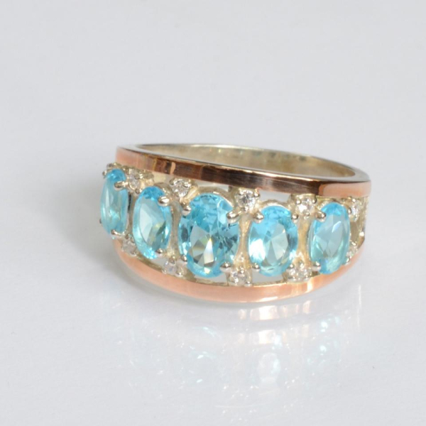 Срібна каблучка з золотими вставками