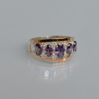 Срібна каблучка з золотими вставками