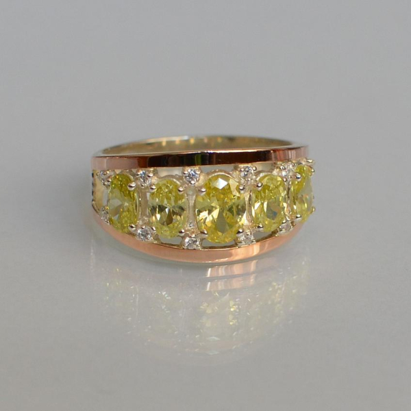 Срібна каблучка з золотими вставками