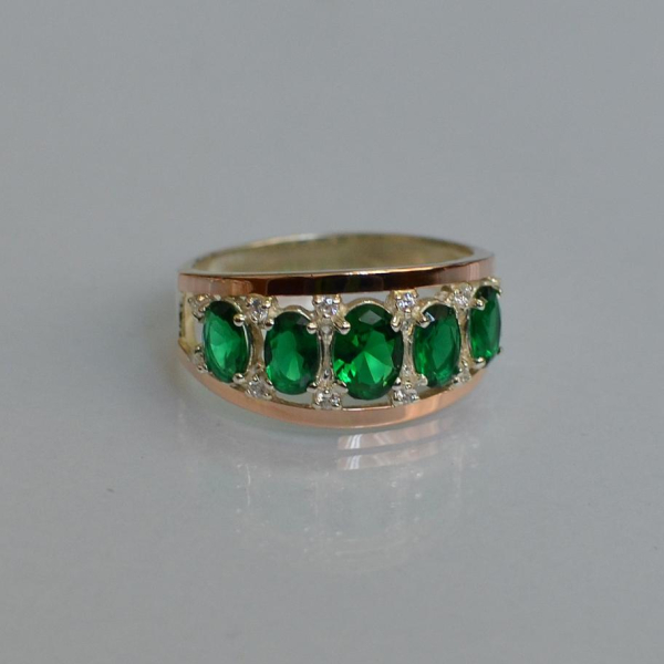 Срібна каблучка з золотими вставками