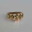 Срібна каблучка з золотими вставками