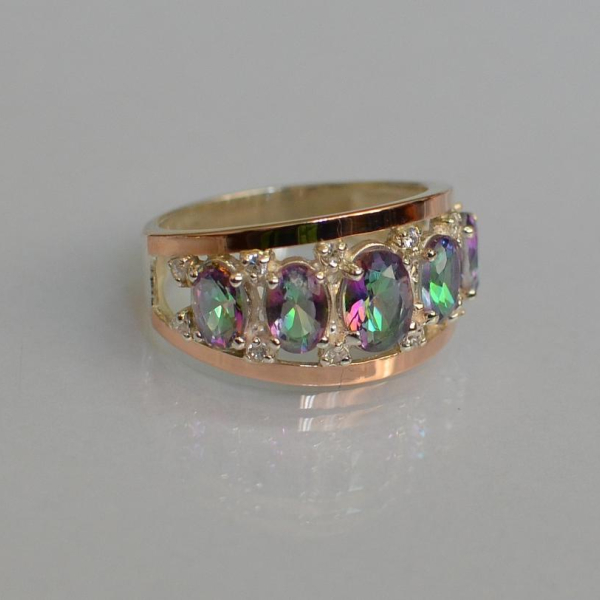 Срібна каблучка з золотими вставками