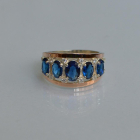 Срібна каблучка з золотими вставками