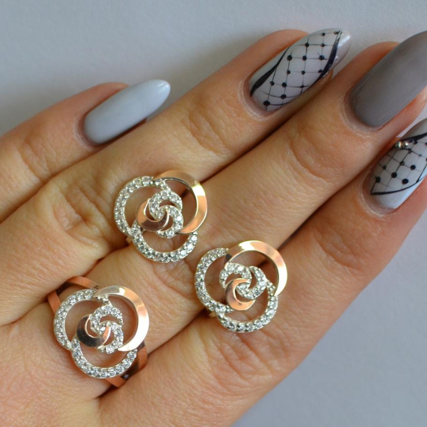 Срібний набір з золотими пластинами