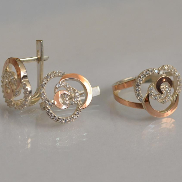 Срібний набір з золотими пластинами