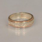 Серебряное кольцо с золотыми вставками