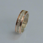 Серебряное кольцо с золотыми вставками