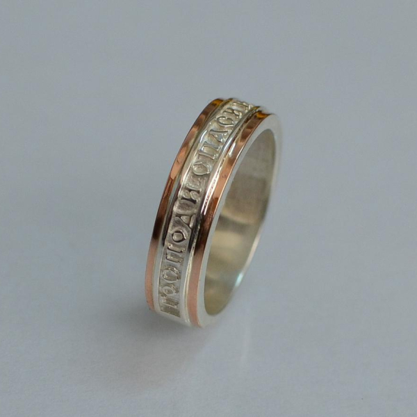 Серебряное кольцо с золотыми вставками