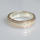 Серебряное кольцо с золотыми вставками