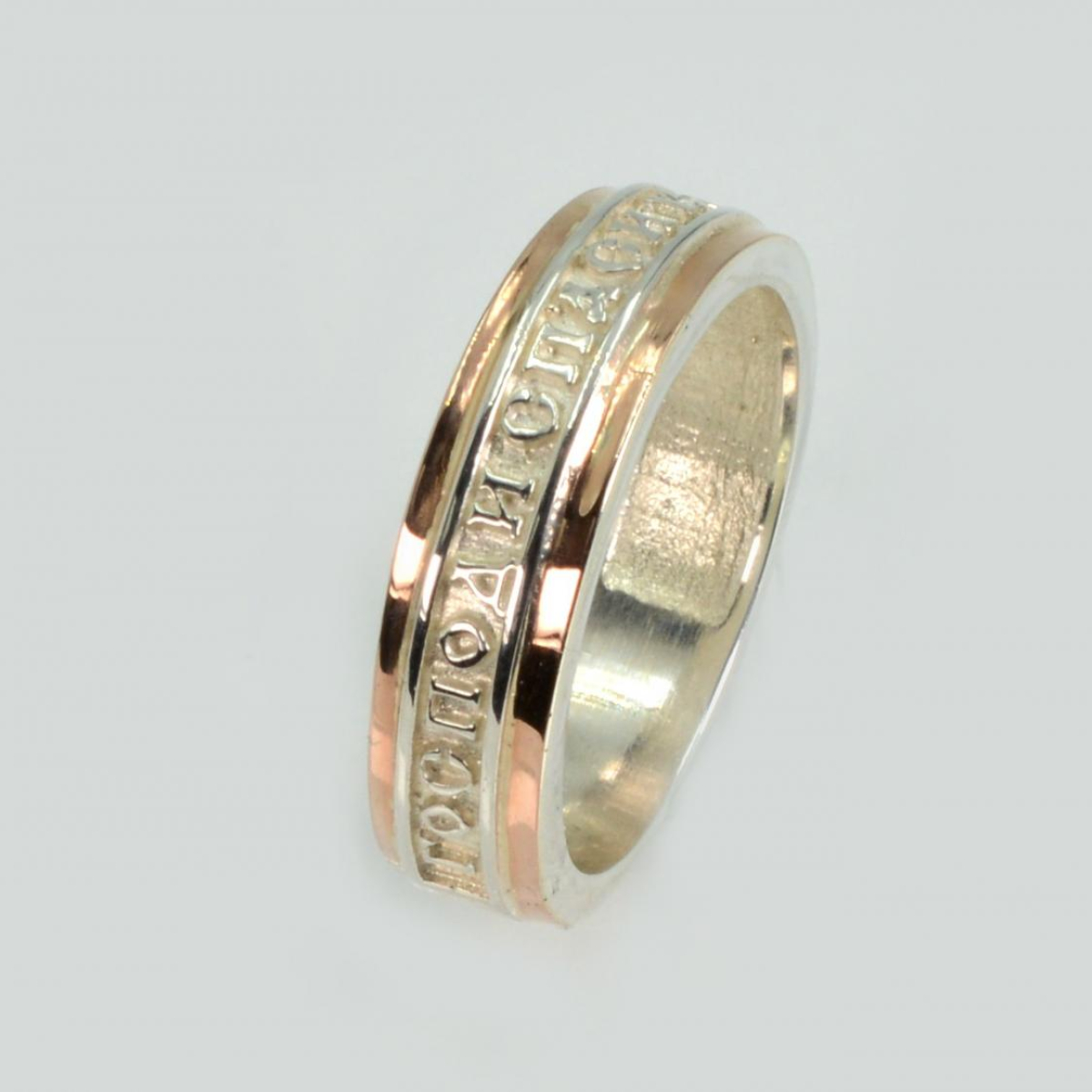 Серебряное кольцо с золотыми вставками