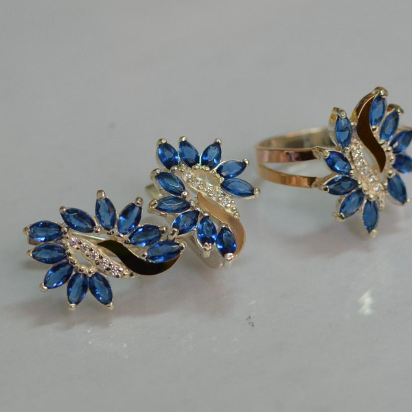 Срібний набір з золотими пластинами