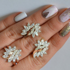 Срібний набір з золотими пластинами