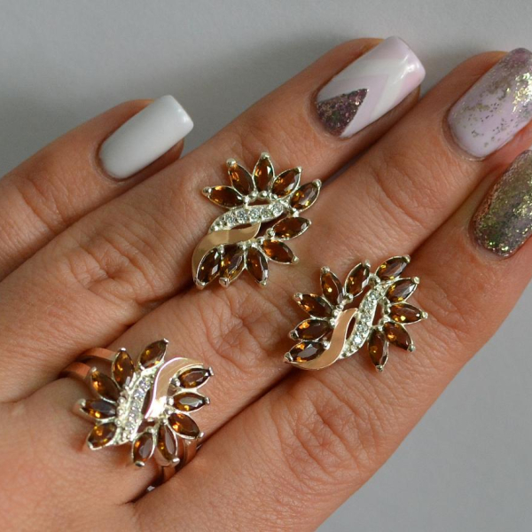 Срібний набір з золотими пластинами