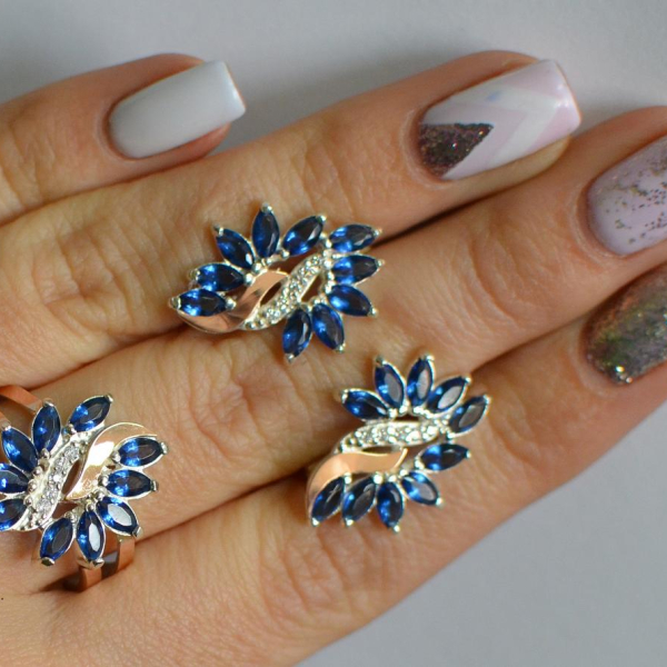 Срібний набір з золотими пластинами