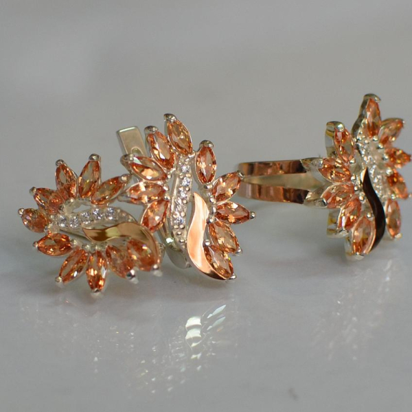 Срібний набір з золотими пластинами