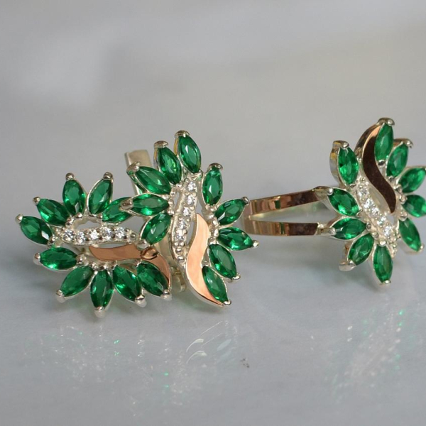 Срібний набір з золотими пластинами