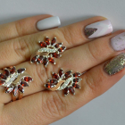 Срібний набір з золотими пластинами