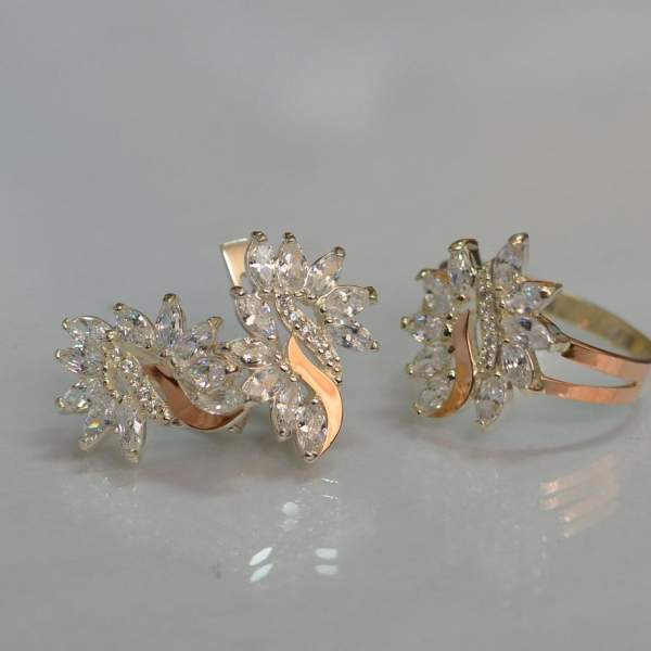 Срібний набір з золотими пластинами