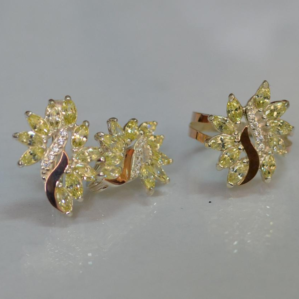 Срібний набір з золотими пластинами