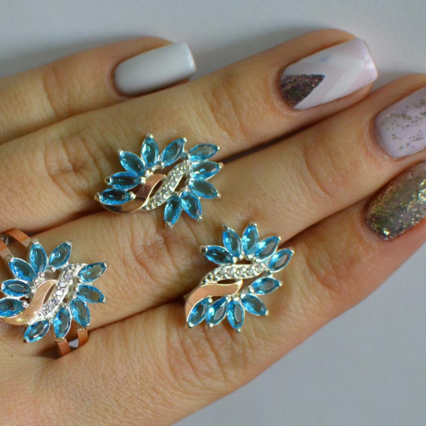 Срібний набір з золотими пластинами