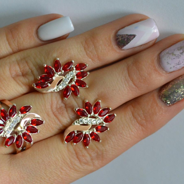 Срібний набір з золотими пластинами