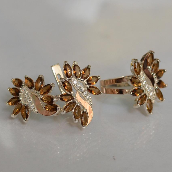 Срібний набір з золотими пластинами