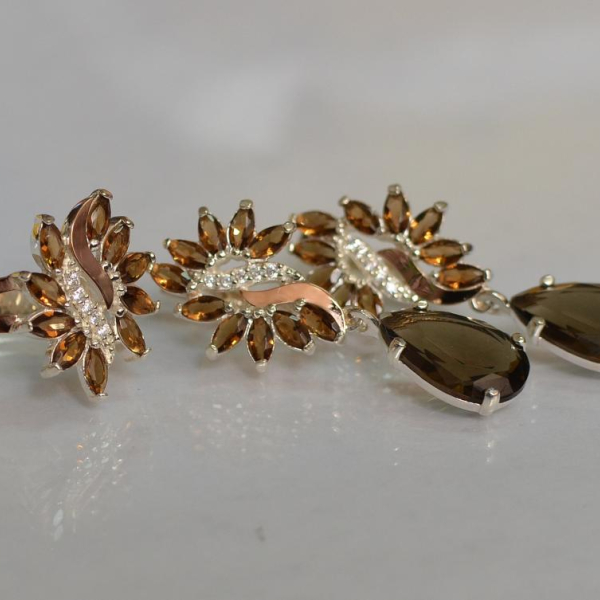 Срібний набір з золотими пластинами